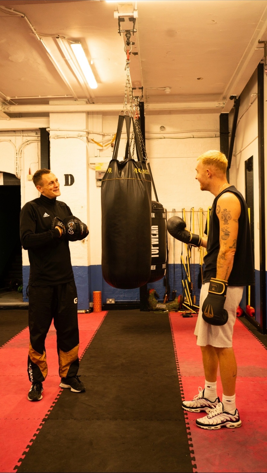 Ed training Milo — on the bag